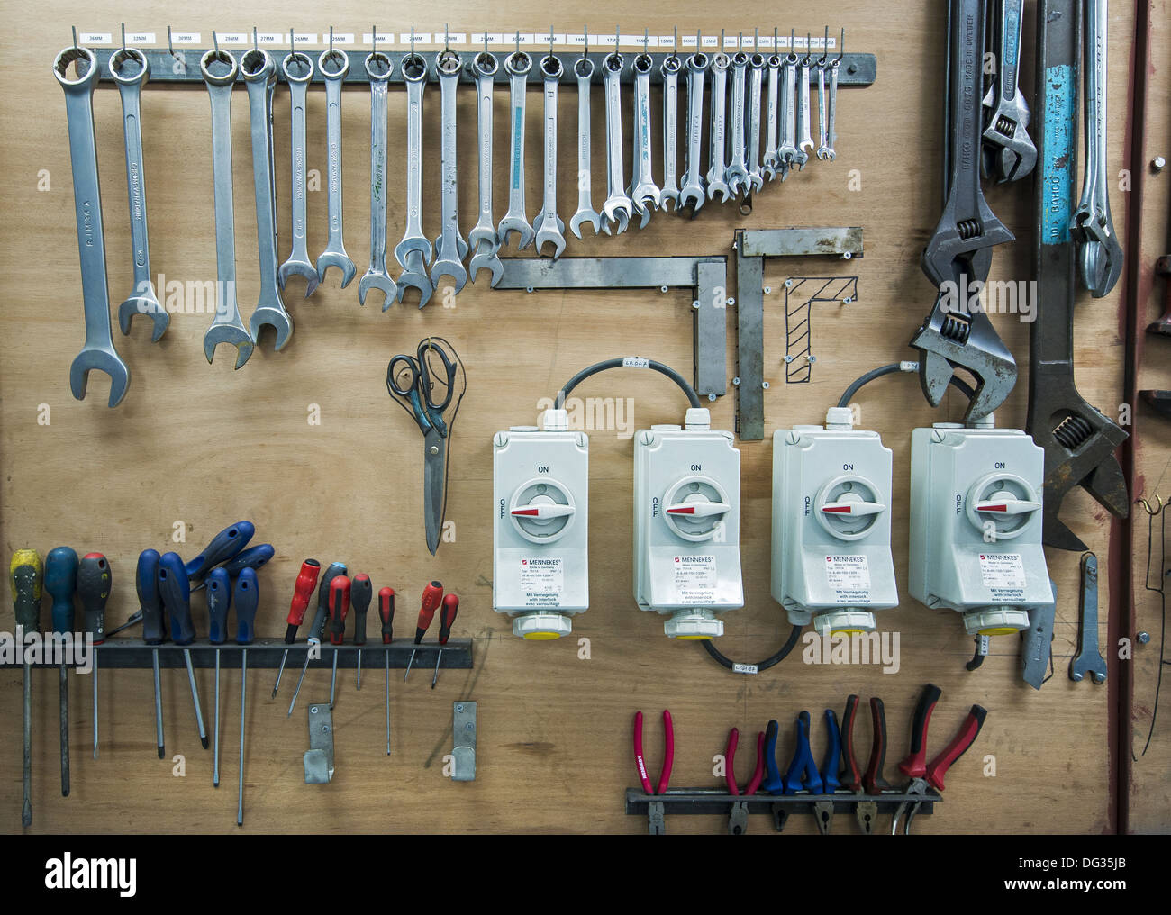 A selection of tools hanging in Stock Photo, Royalty Free