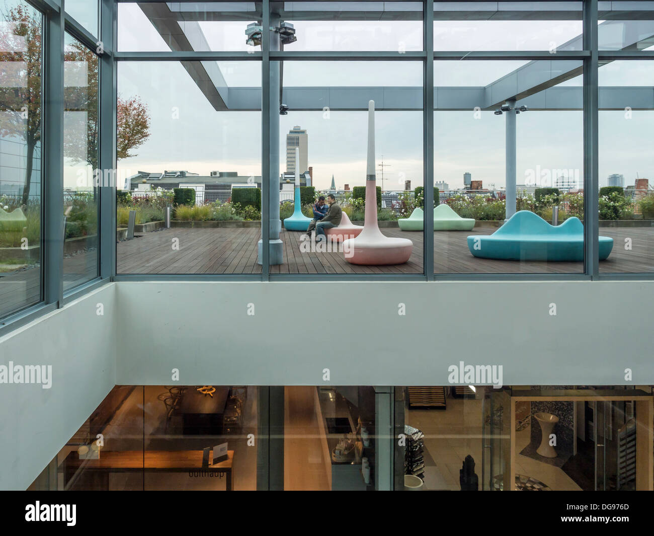 Rooftop garden with modern chairs and top floor shops of the stilwerk furniture centre kant street berlin