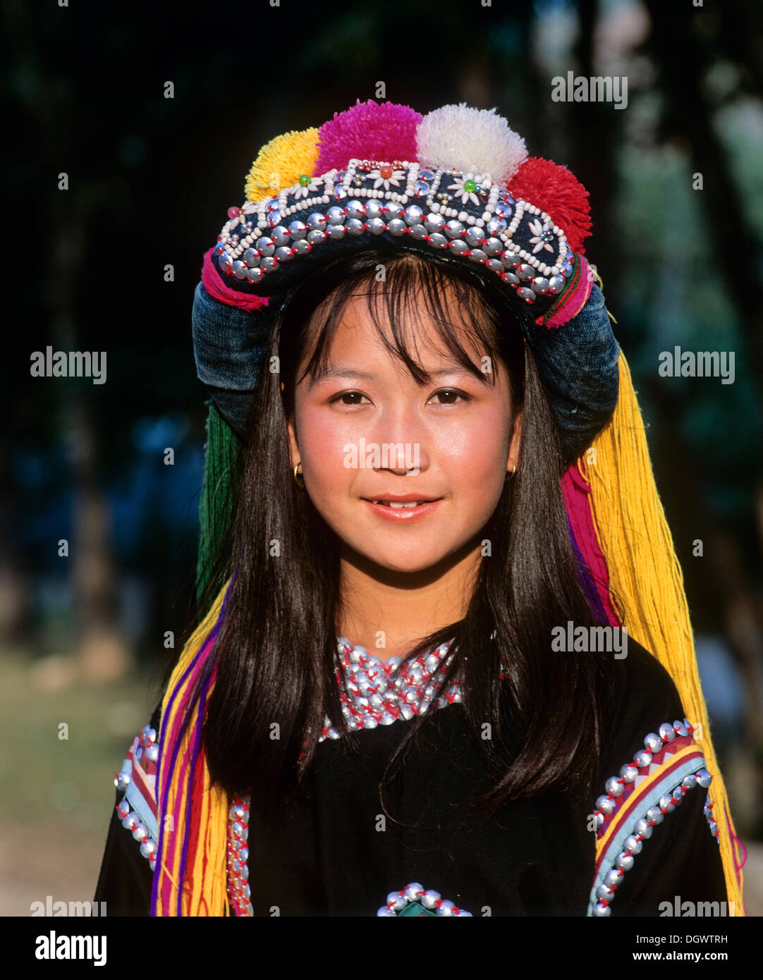 Lisu girl wearing a colourful headdress and the traditional costume