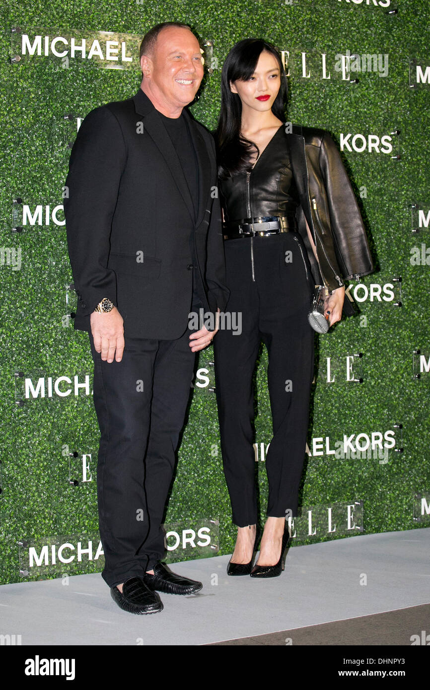 Preview. Tokyo, Japan. 13th Nov, 2013. (L to R) The fashion designer Michael Kors and ...