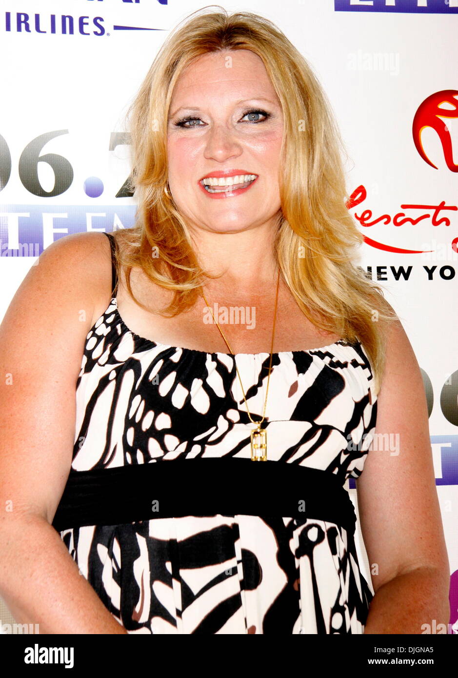 Radio personality Delilah Rene Luke 106.7 Lite FM’s Broadway in Stock