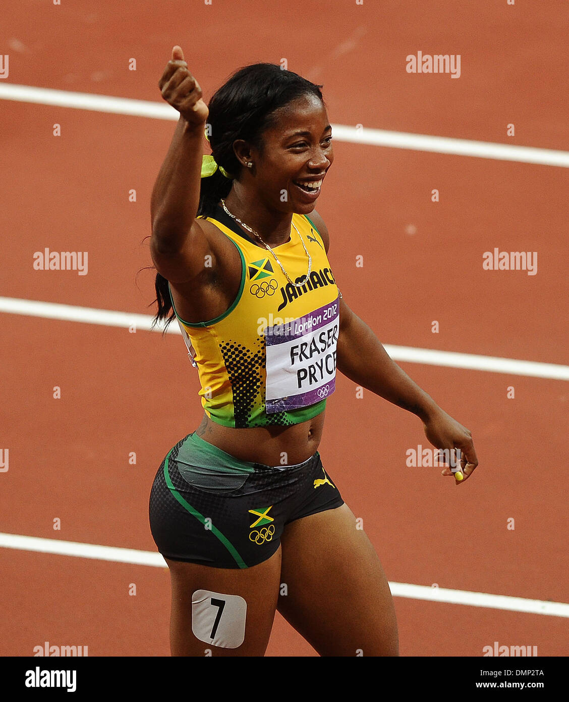 shelly-ann-fraser-pryce-of-jamaica-celebrates-winning-gold-in-womens-DMP2TA.jpg