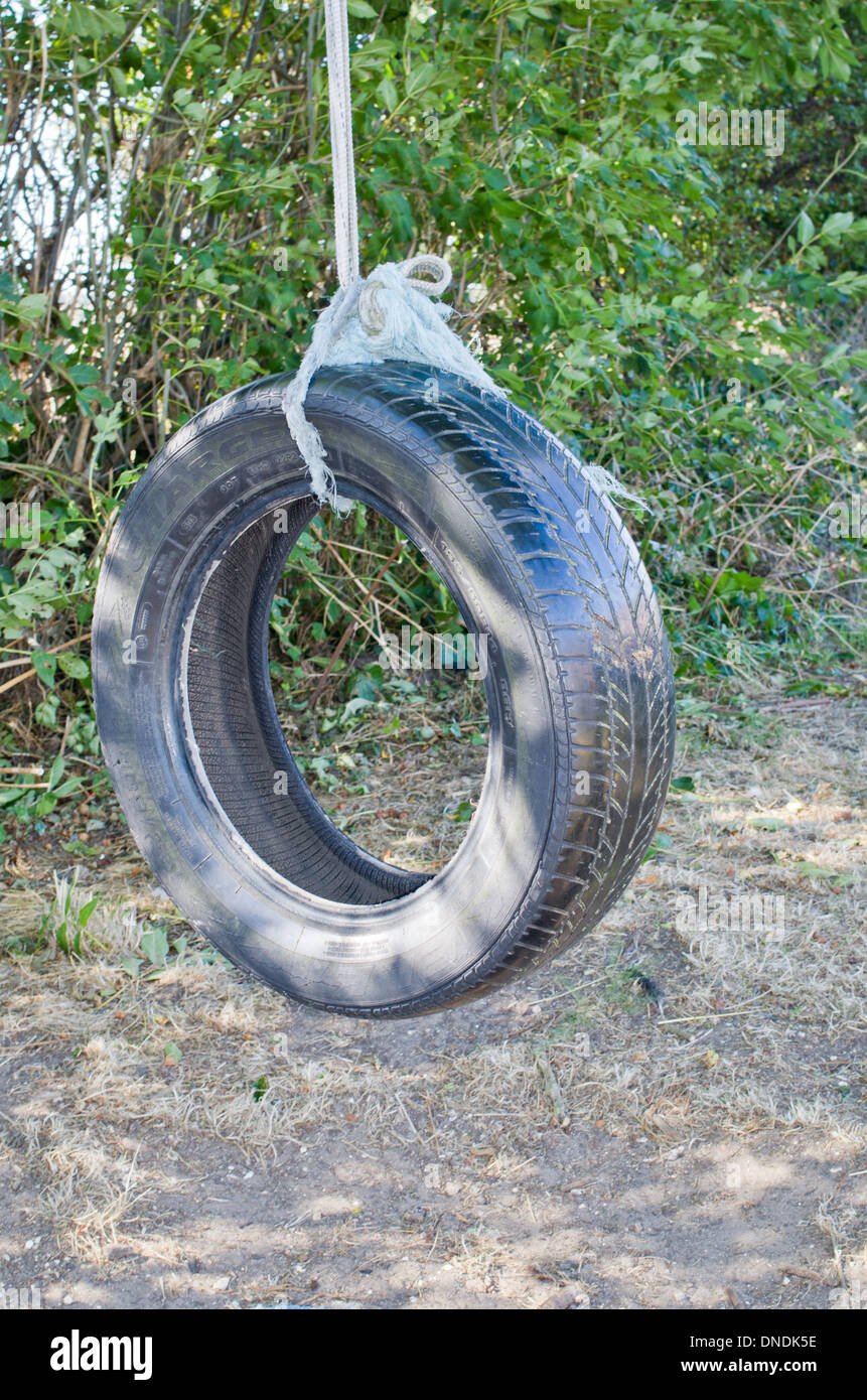 Old car tyre used as swing Stock Photo, Royalty Free Image ...