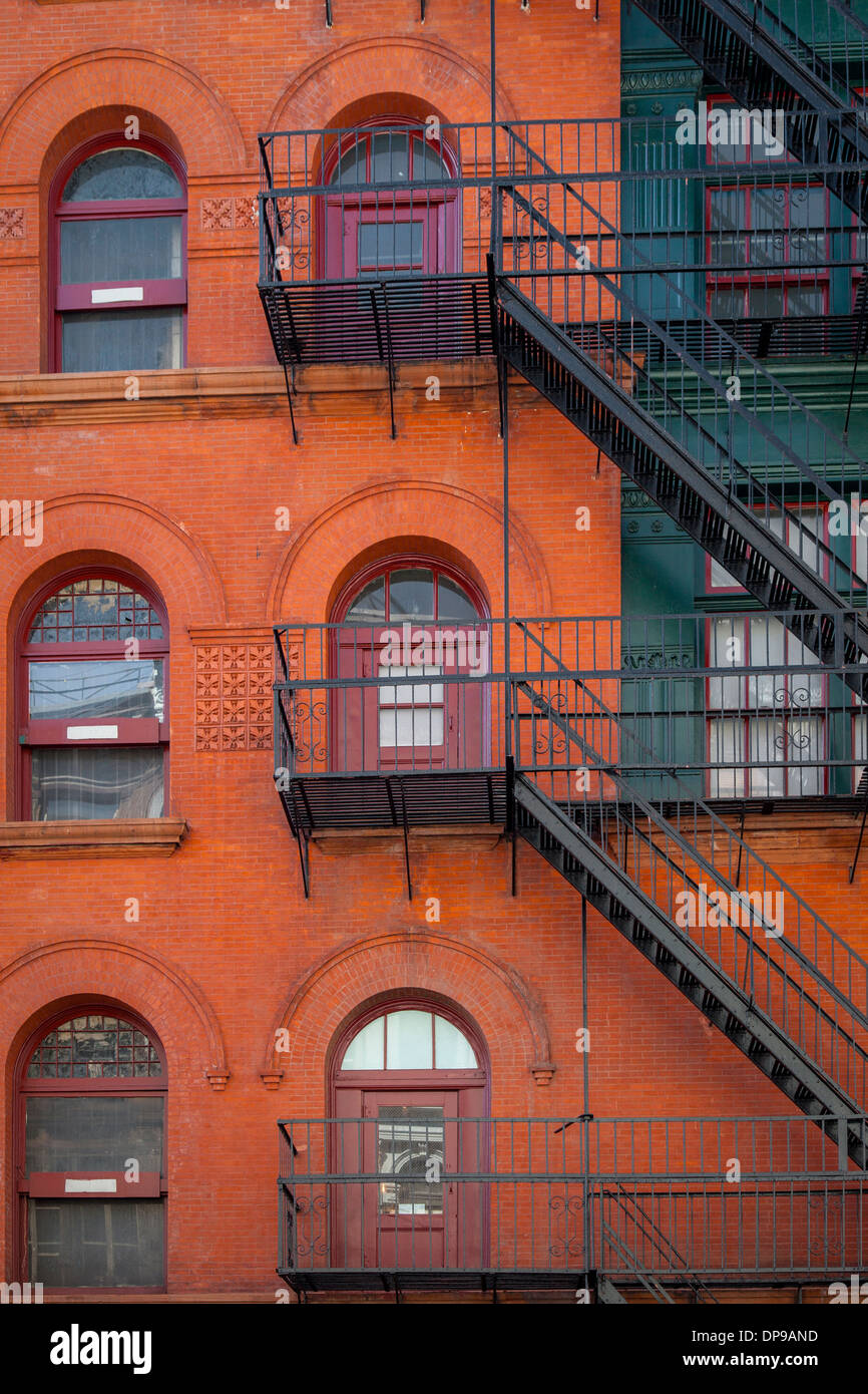 Brick Apartment Building tenement housing, new york city, usa, 1890s. artist: unknown stock Brick Apartment Building tenement housing, new york city, usa, 1890s. artist: unknown stock