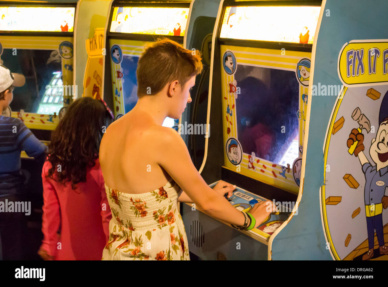 stock photo visitors families children people having fun with video games in disney quest in walt disney world in florida - Childrens Games Free Disney stock photo visitors families children people having fun with video games in disney quest in walt disney world in florida - Childrens Games Free Disney
