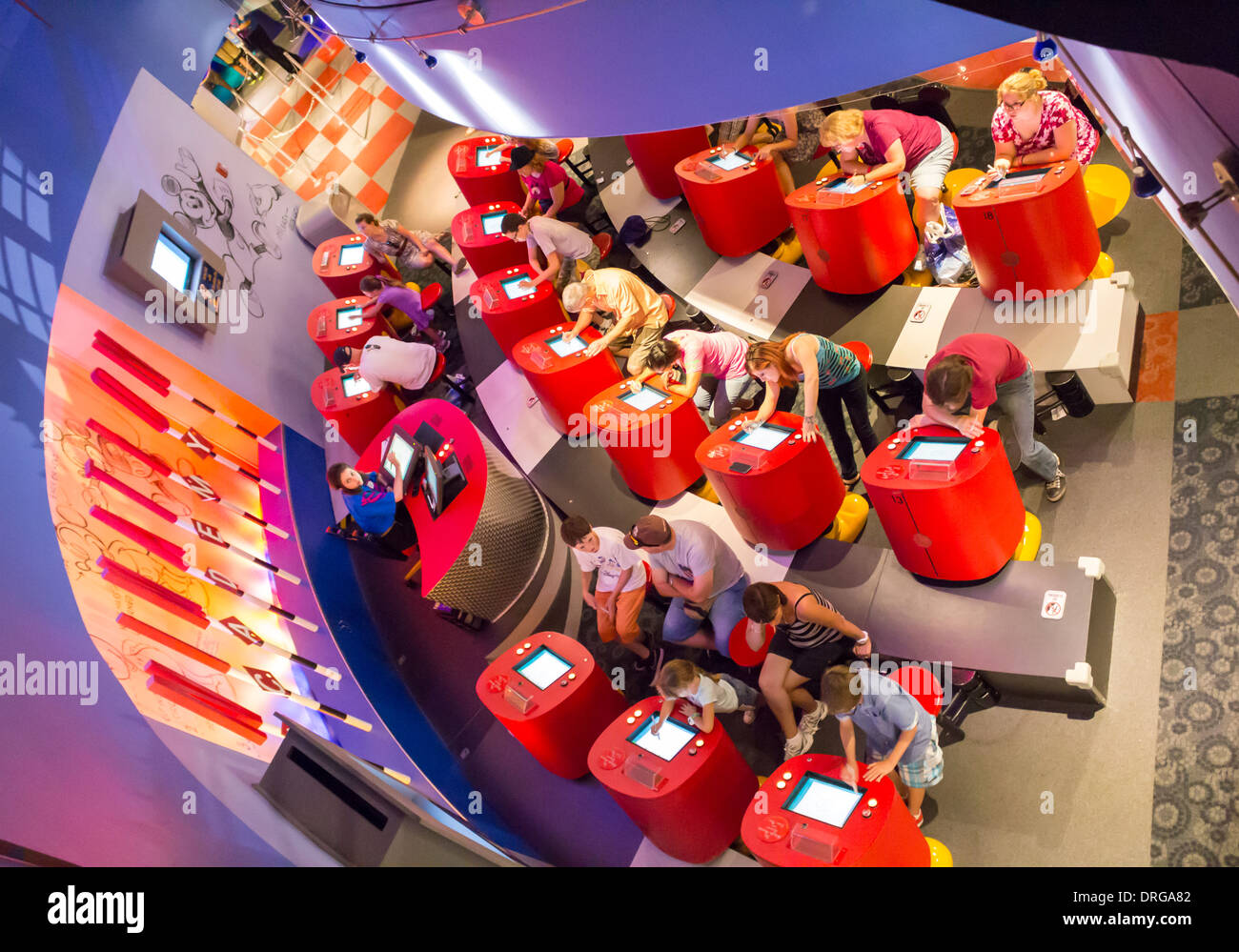 stock photo visitors families children people having fun with video games in disney quest in walt disney world in florida - Childrens Games Free Disney stock photo visitors families children people having fun with video games in disney quest in walt disney world in florida - Childrens Games Free Disney
