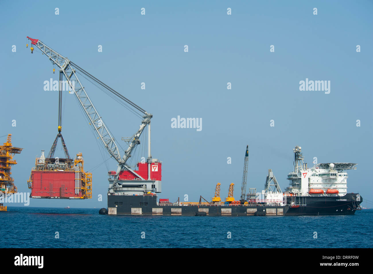 Offshore construction work with heavy lifting crane vessel at work