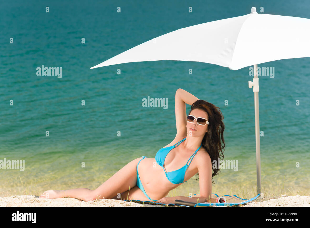 Summer Beach Woman Blue Bikini Under Parasol Stock Photo Alamy