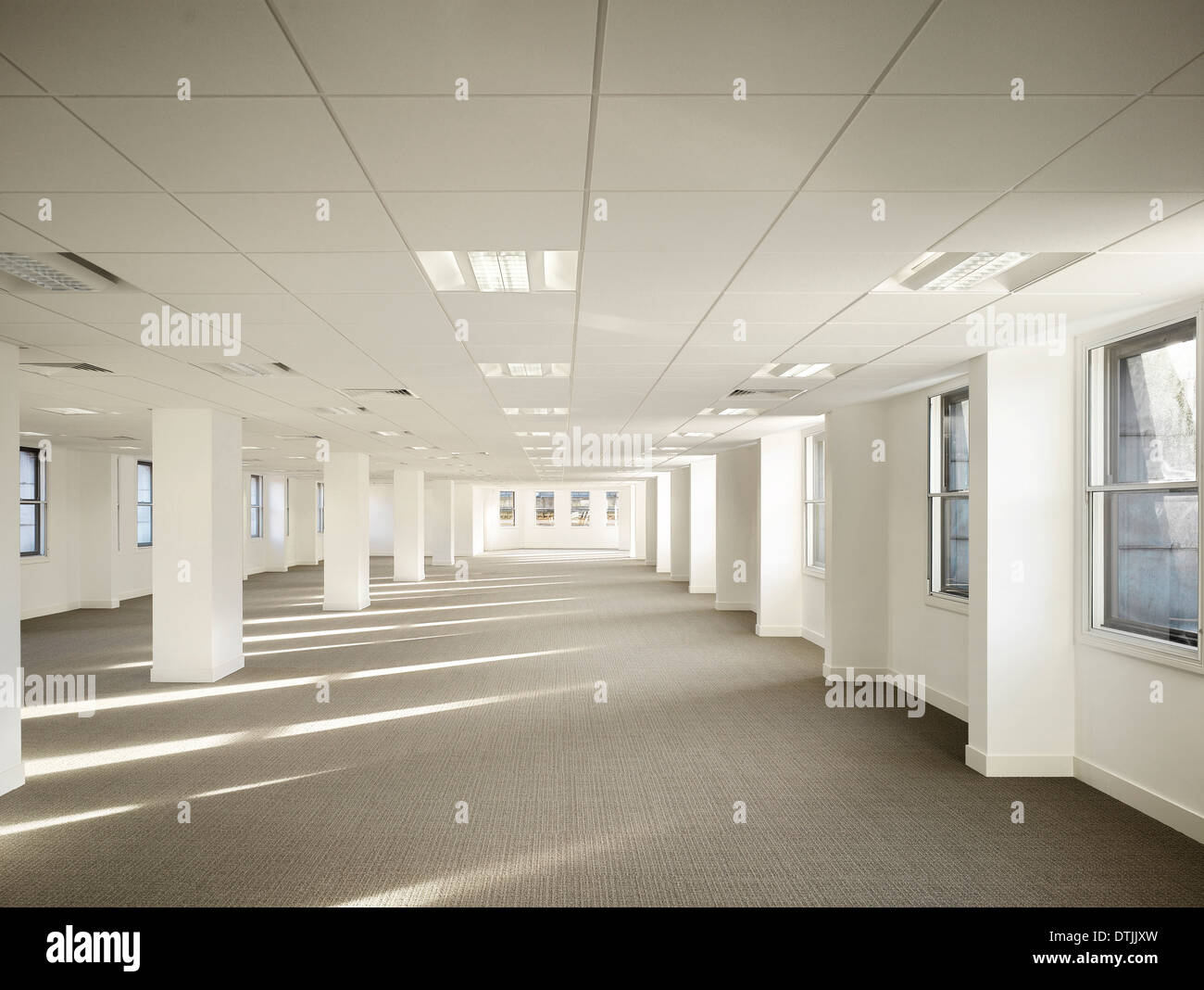 interior of empty office space in commercial building king street DTJJXW