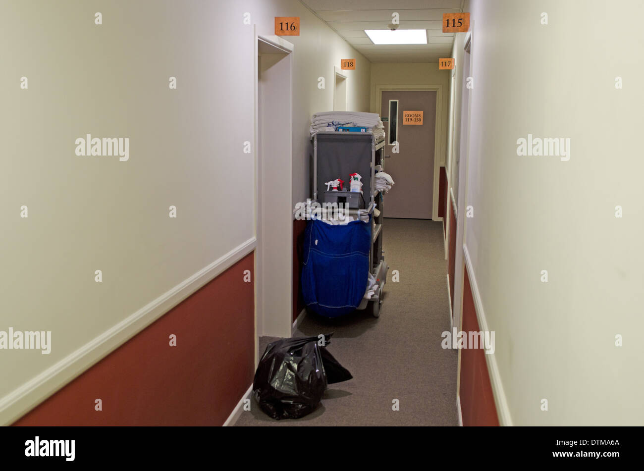 Room service equipment in hotel corridor Stock Photo, Royalty Free