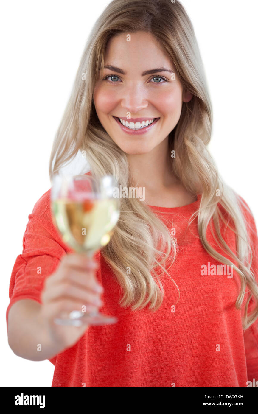 Happy woman showing white wine glass Stock Foto