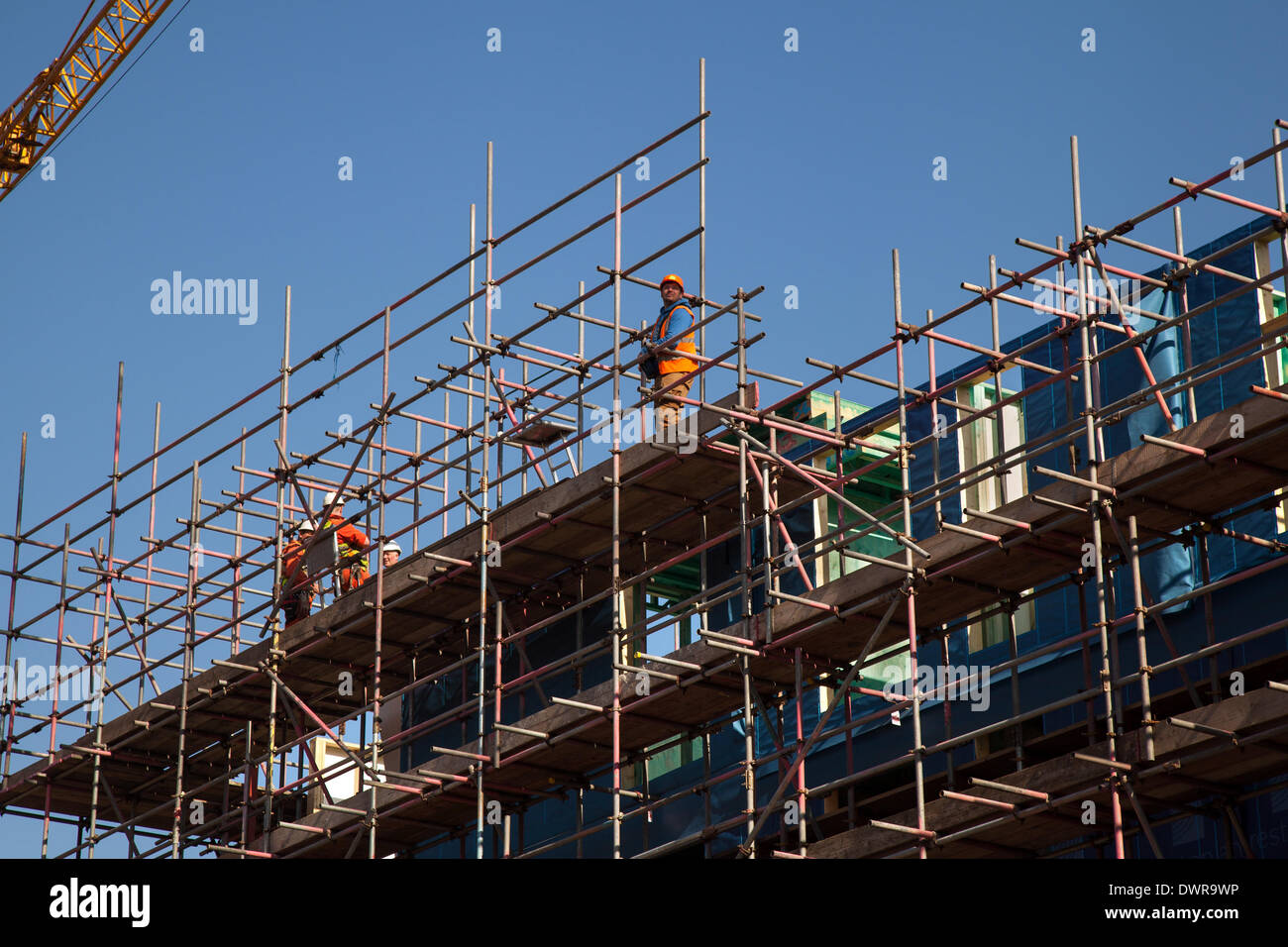 Manchester, UK 12th March, 2014. City construction boom. Scaffold Stock