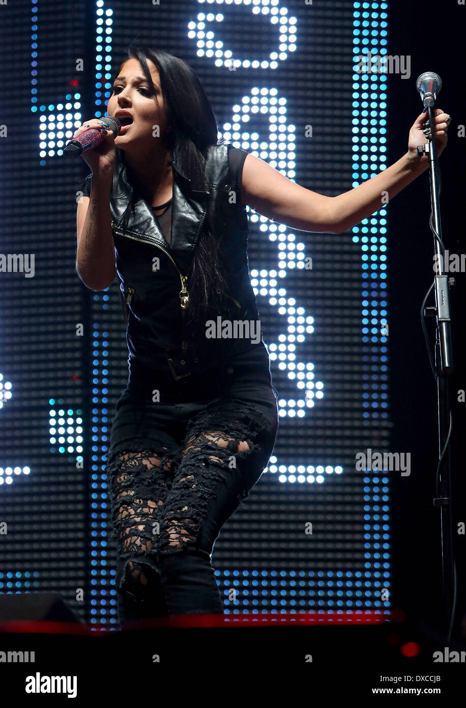 Tulisa Contostavlos , performing at the Key 103 Jingle Ball at Stock