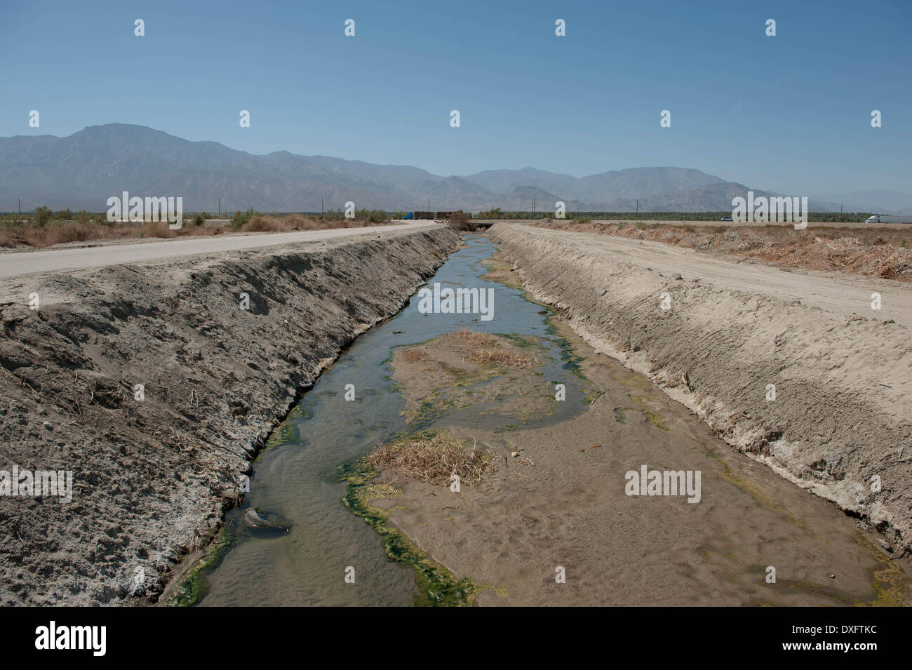 Mecca, California, USA. 21st Mar, 2014. A canal for irrigation runoff