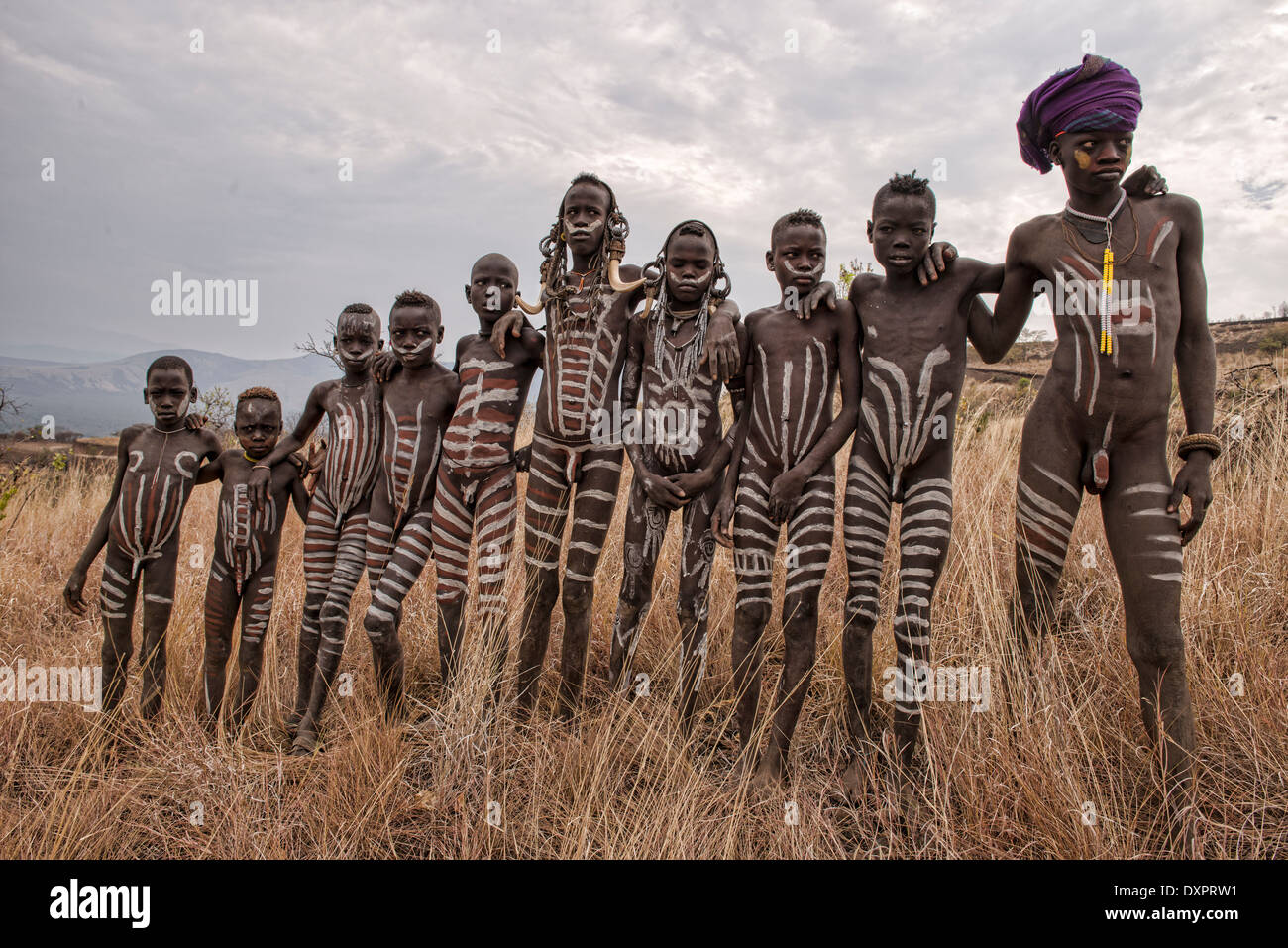 Mursi boys in the Lower Omo Valley of Ethiopia Stock Photo: 68113837