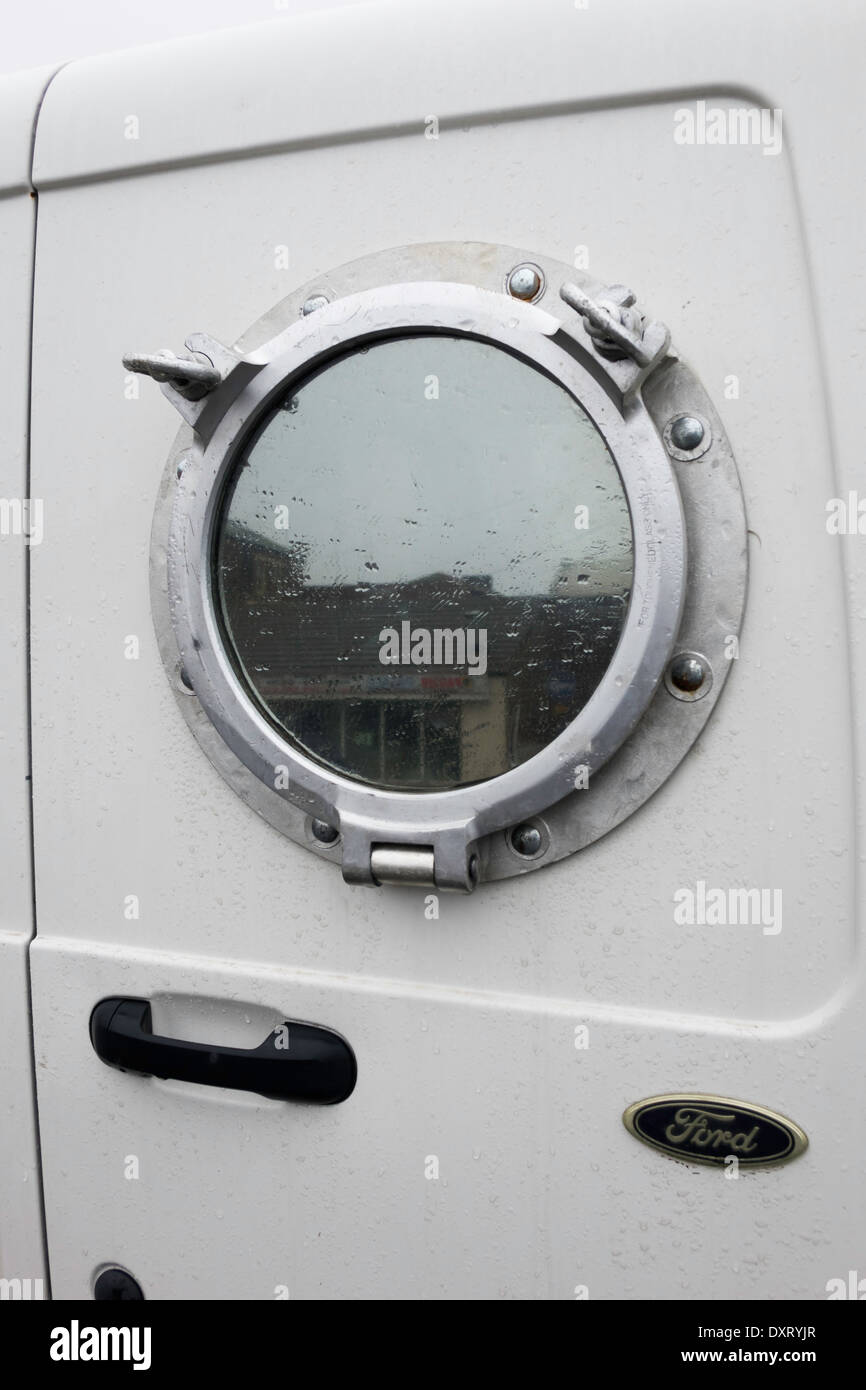 Unusual modification to a small white van rear doors fitted with Unusual modification to a small white van rear doors fitted with