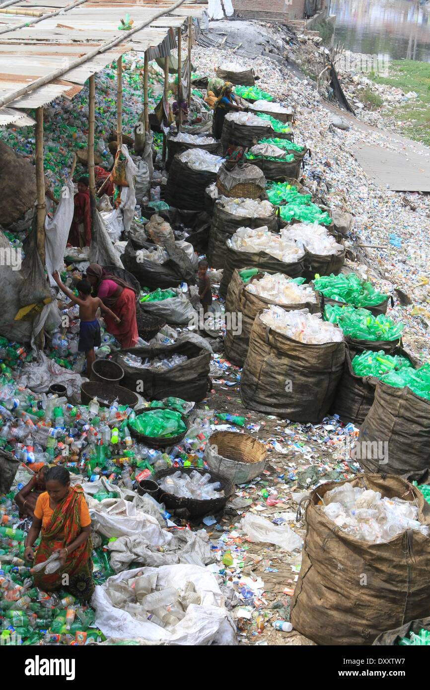 Bangladeshi people works in a plastic bottle recycling factory Stock