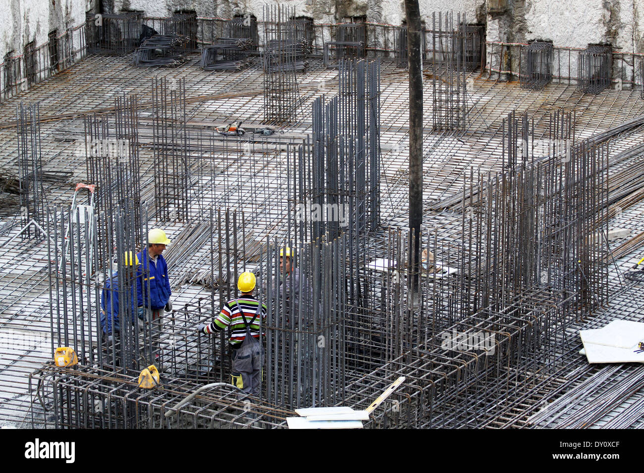Installing binding wires to reinforcement steel bars at construction