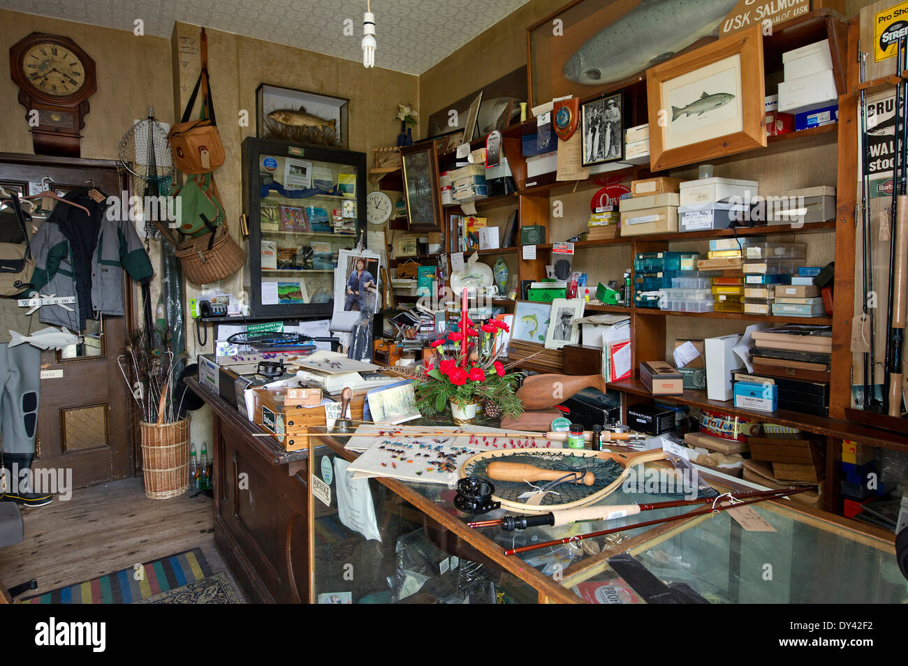 Sweet's Tackle Shop, Usk, with manager Jean Williams seen making Stock
