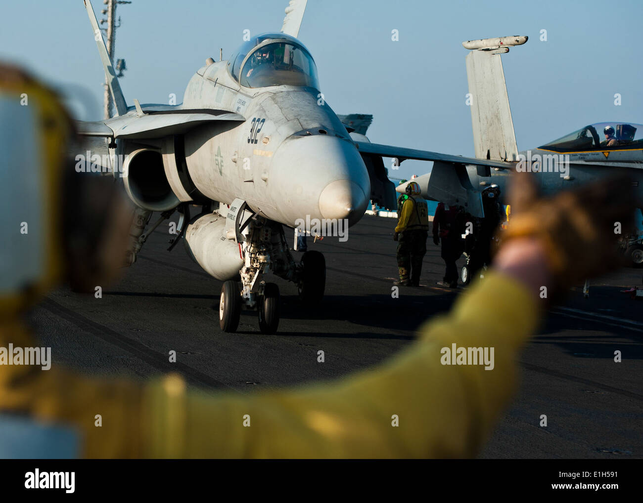 U S Navy Aviation Boatswain S Mate 3rd Class Eric Augustine Directs An