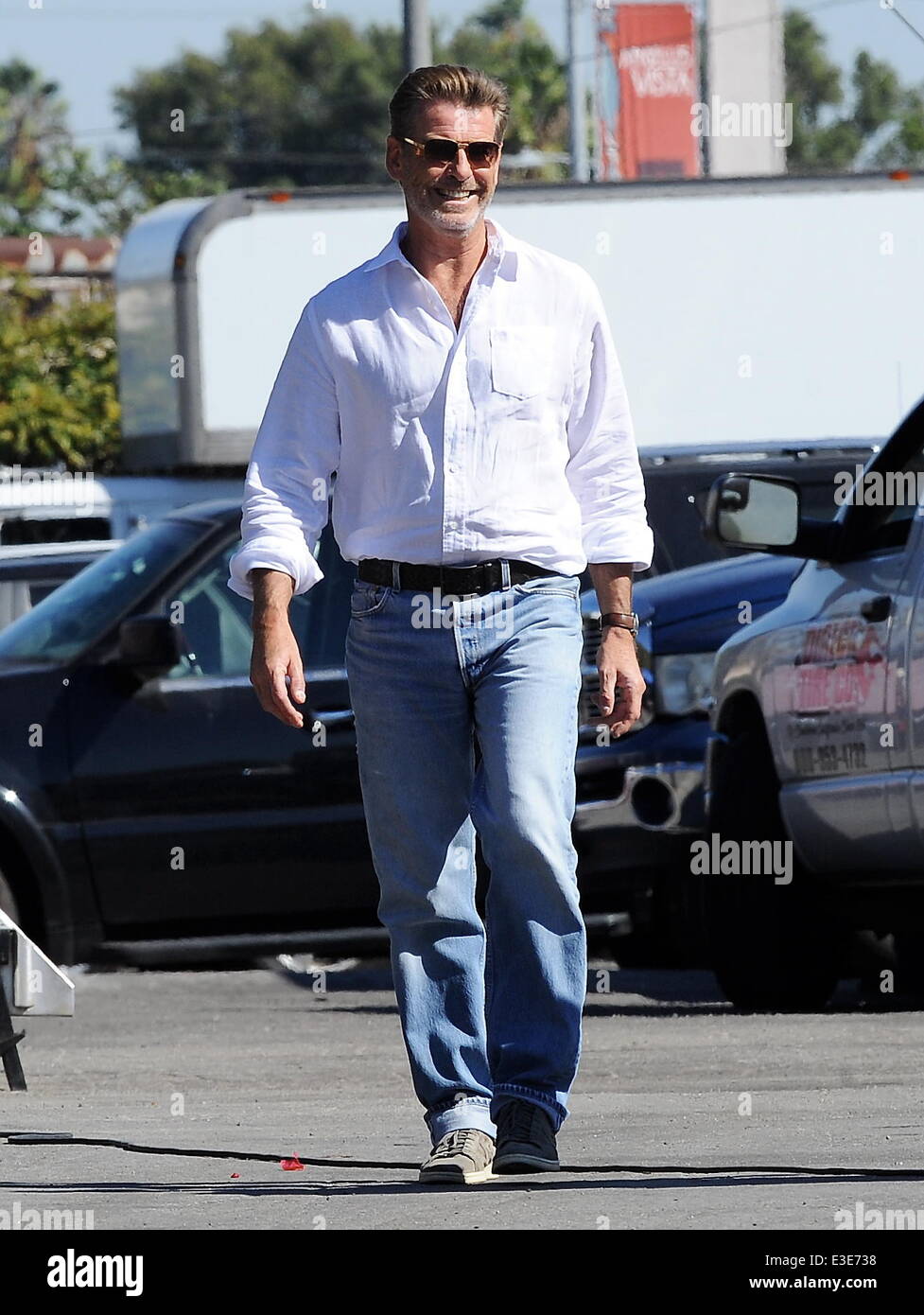 Pierce Brosnan Is All Smiles While Walking Around On The Set Of His New