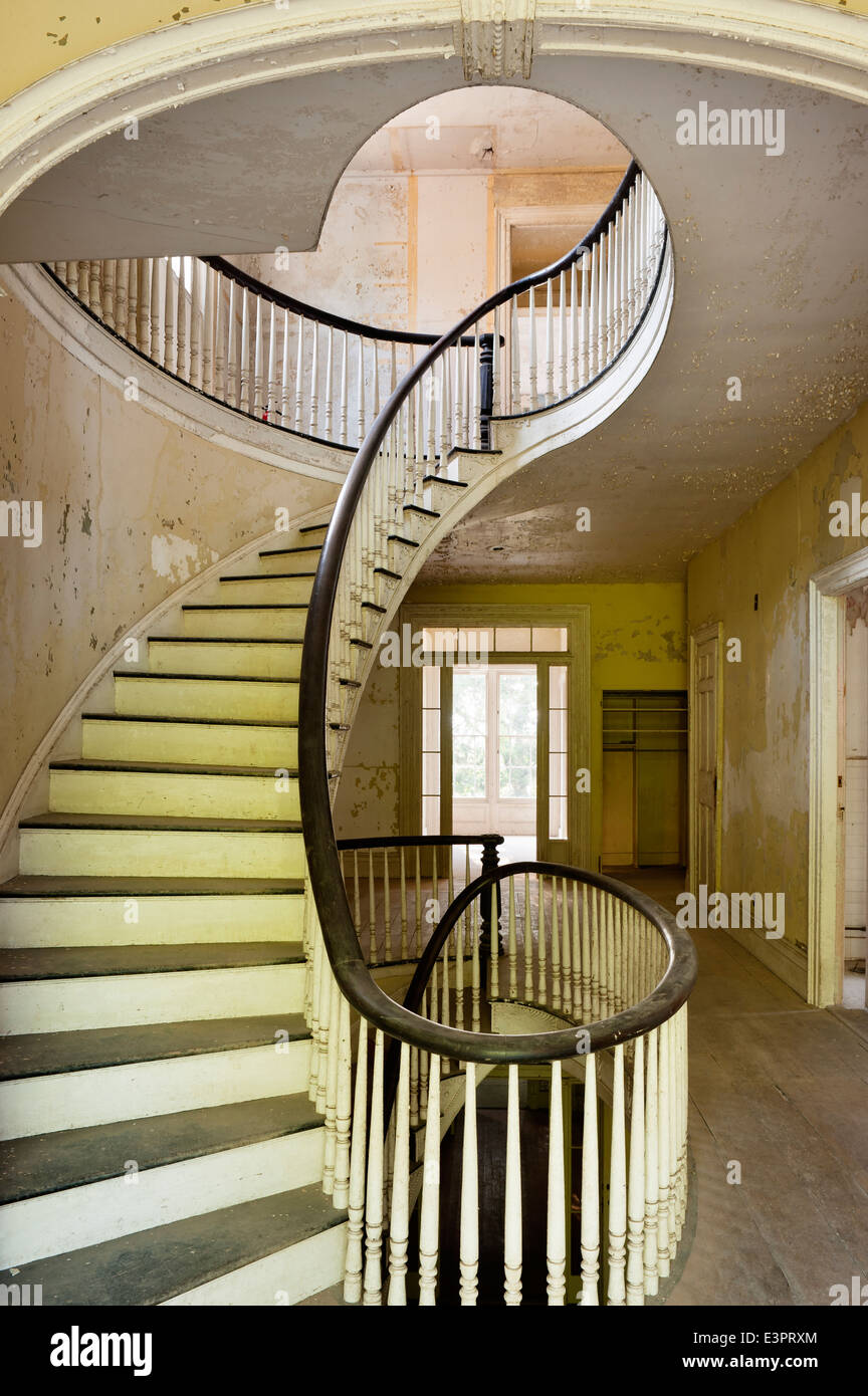 First floor landing with elliptical staircase of empty house with Stock