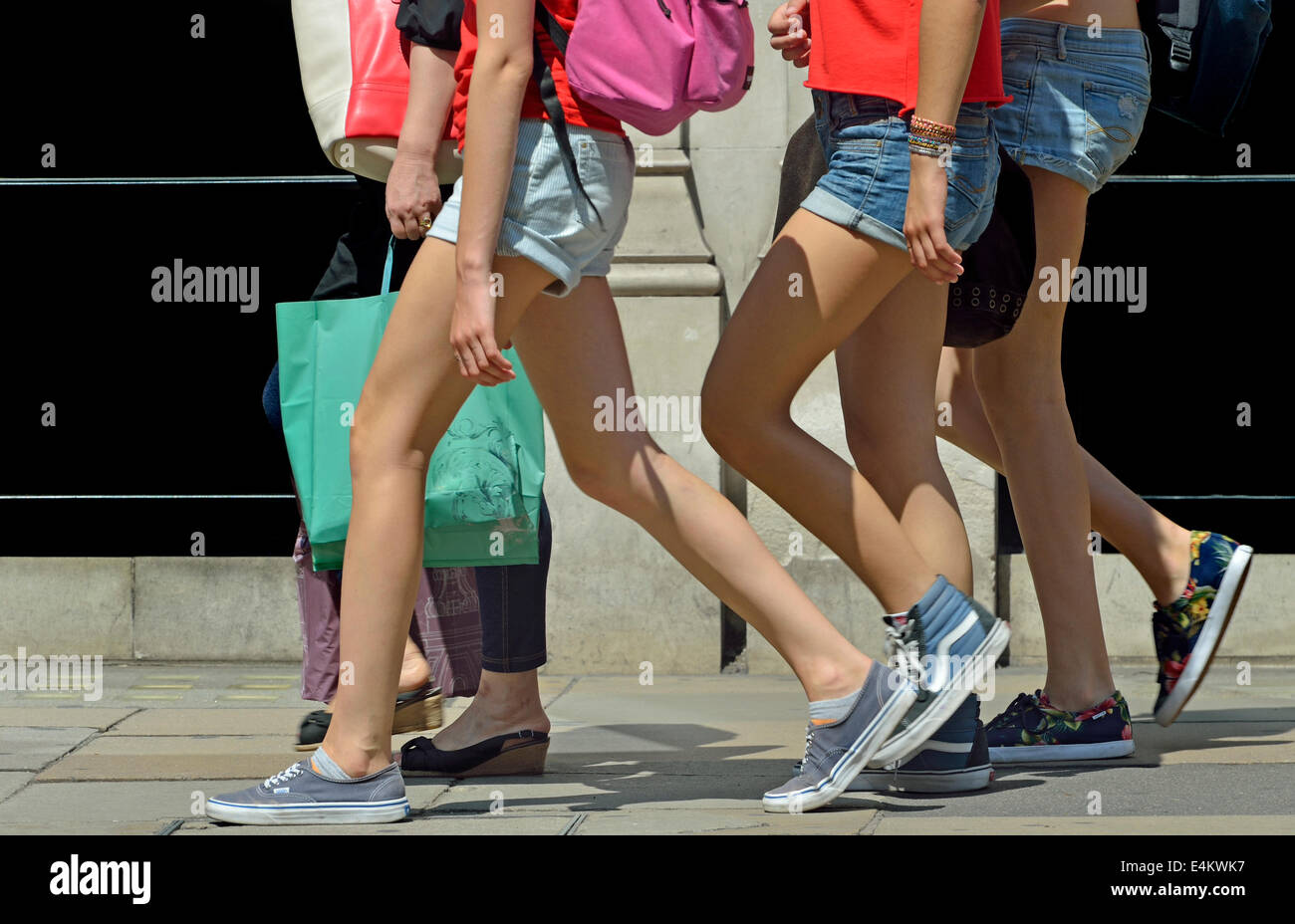London, England, UK. Girls wearing shorts in Piccadilly Stock Photo