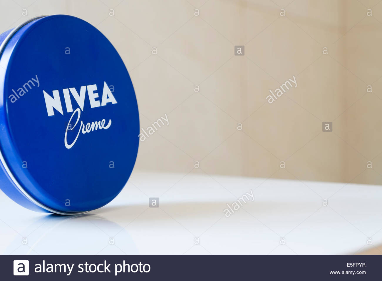Stock Photo - A distinctive blue tin of Nivea Creme