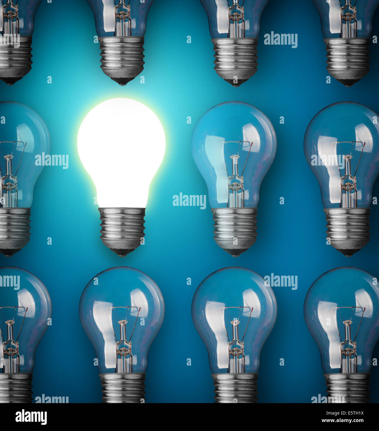 Idea Concept With Light Bulbs On Blue Background Stock Photo Alamy