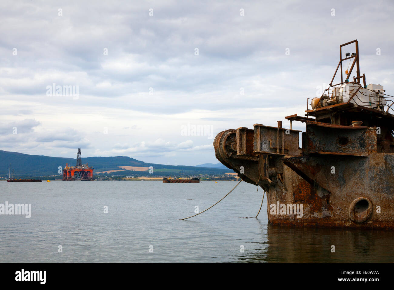 Invergordon, Scotland, UK. Oil rigs and service vessels have lined up