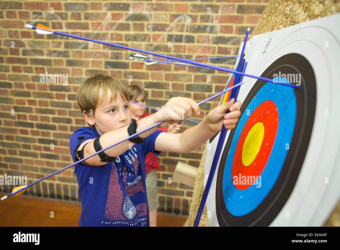 Indoor archery lesson at 'Experience Archery' in London, England, UK
