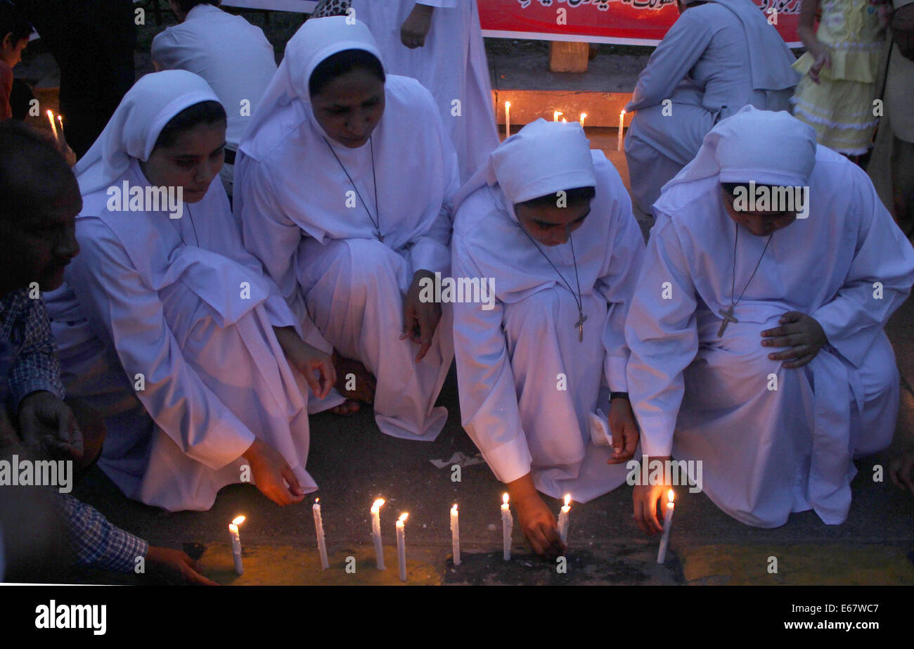 Pakistani Christian community light candles in the memory of Stock