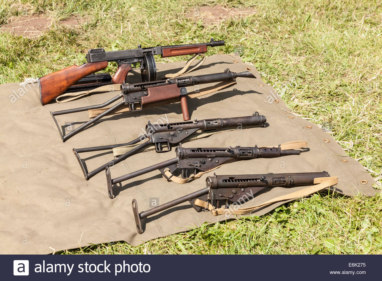 A display of weapons used in world war two including a Thompson Sub