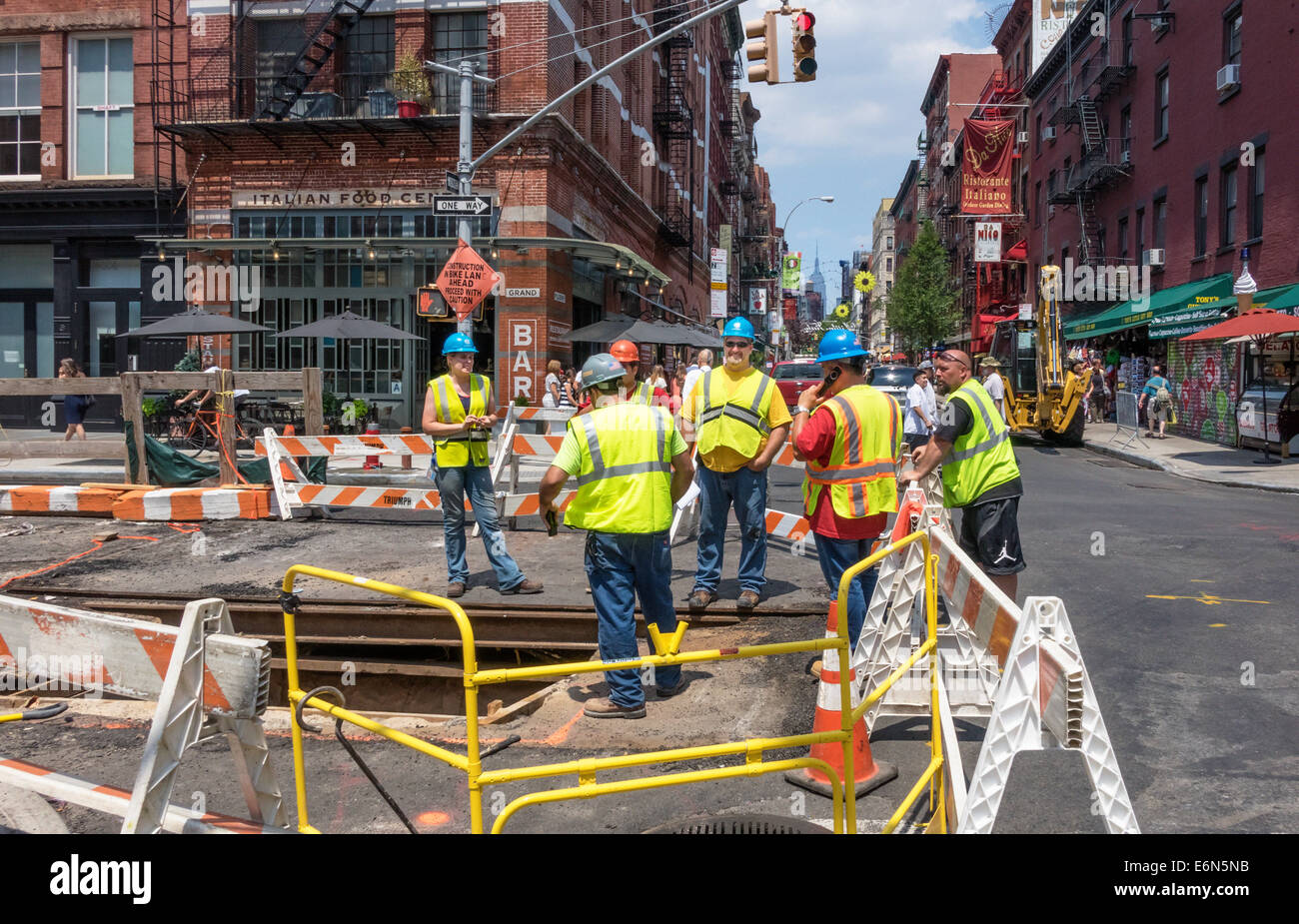 construction-workers-updating-infrastructure-in-little-italy-in-new-E6N5NB.jpg