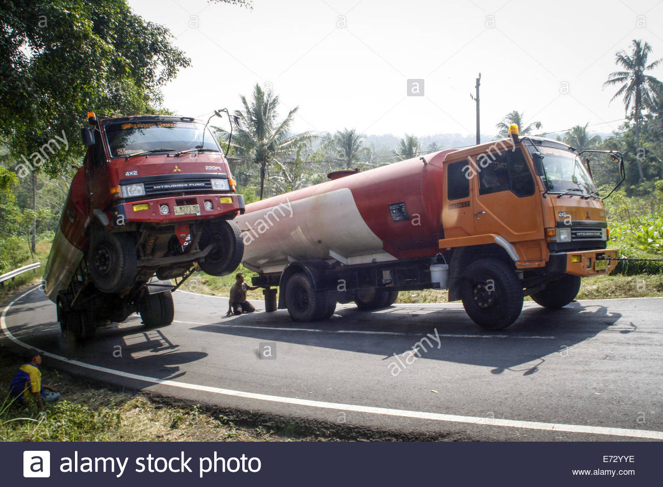 TEMANGGUNG, INDONESIA AUGUST 28 A molasses truck overloaded is Stock