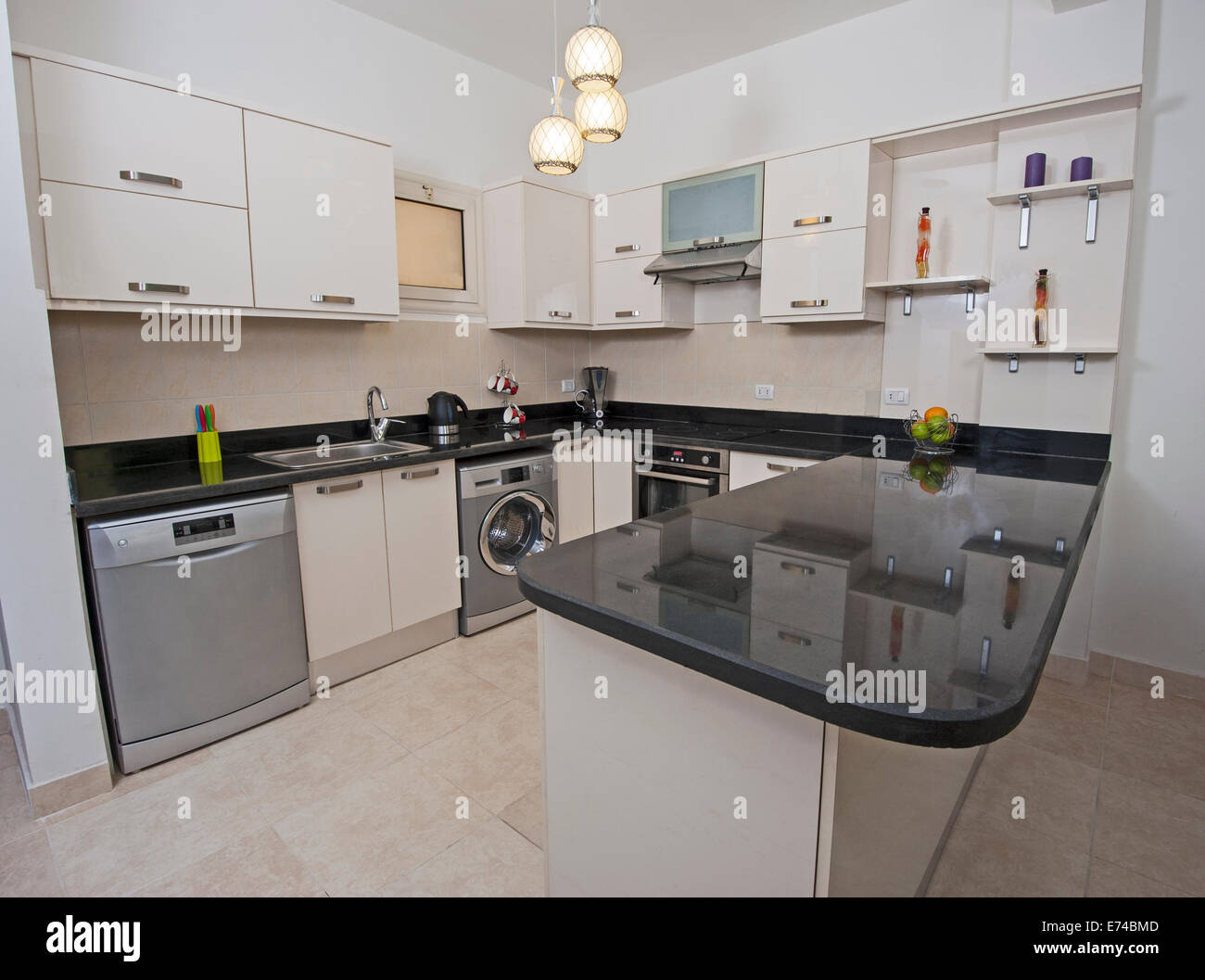 American style kitchen area of luxury apartment showing interior American style kitchen area of luxury apartment showing interior