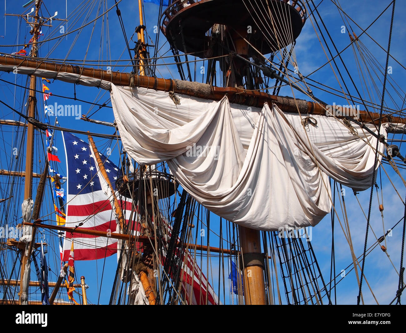 Looking up into the rigging and masts of a tall ship, a rolled up Stock