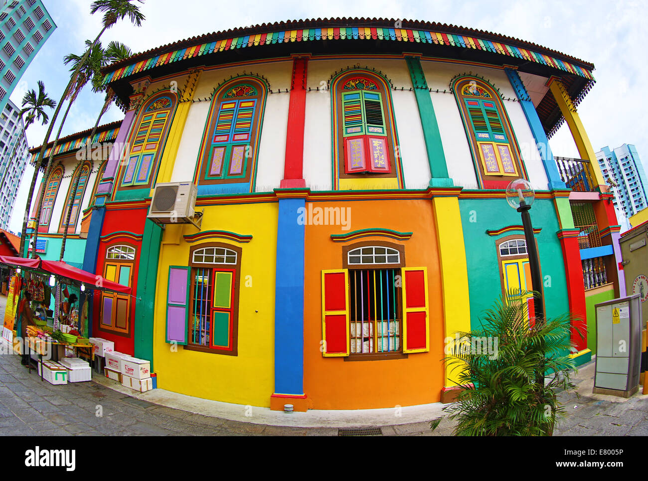 Traditional rainbow coloured house with colourful windows and shutters in little india in singapore republic