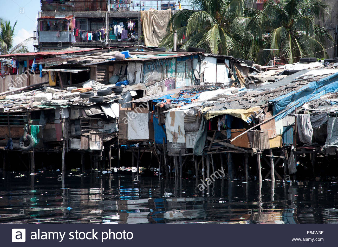 House along the canal in the dangerous district Tondo in Manila Stock