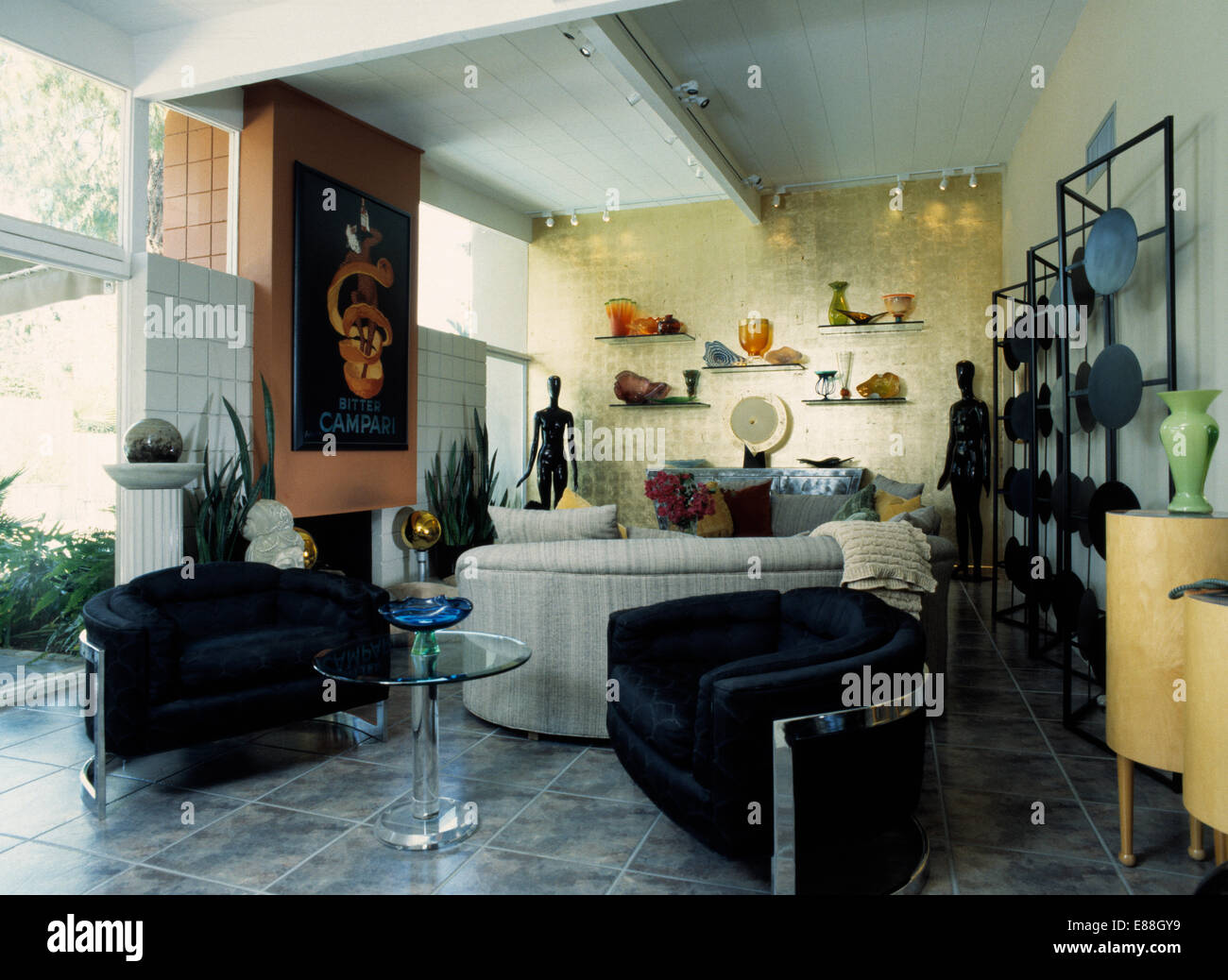 Black Armchairs And Glass Pedestal Table In Modern Living Room Black Armchairs And Glass Pedestal Table In Modern Living Room