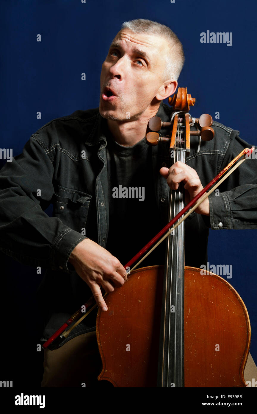 Man With Cello Stock Photo Alamy