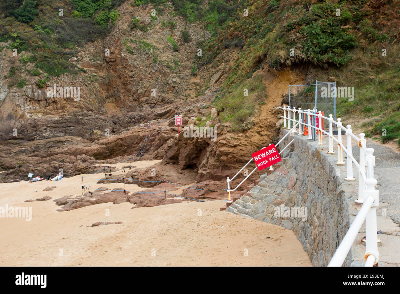 Gr Ve De Lecq Beach Rock Fall Warning Sign Stock Photo Alamy