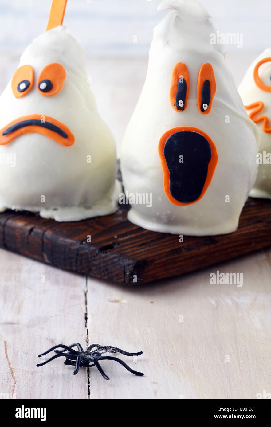 scary edible halloween party decorations with fresh pears covered in white chocolate and marzipan to resemble - Edible Halloween Decorations scary edible halloween party decorations with fresh pears covered in white chocolate and marzipan to resemble - Edible Halloween Decorations
