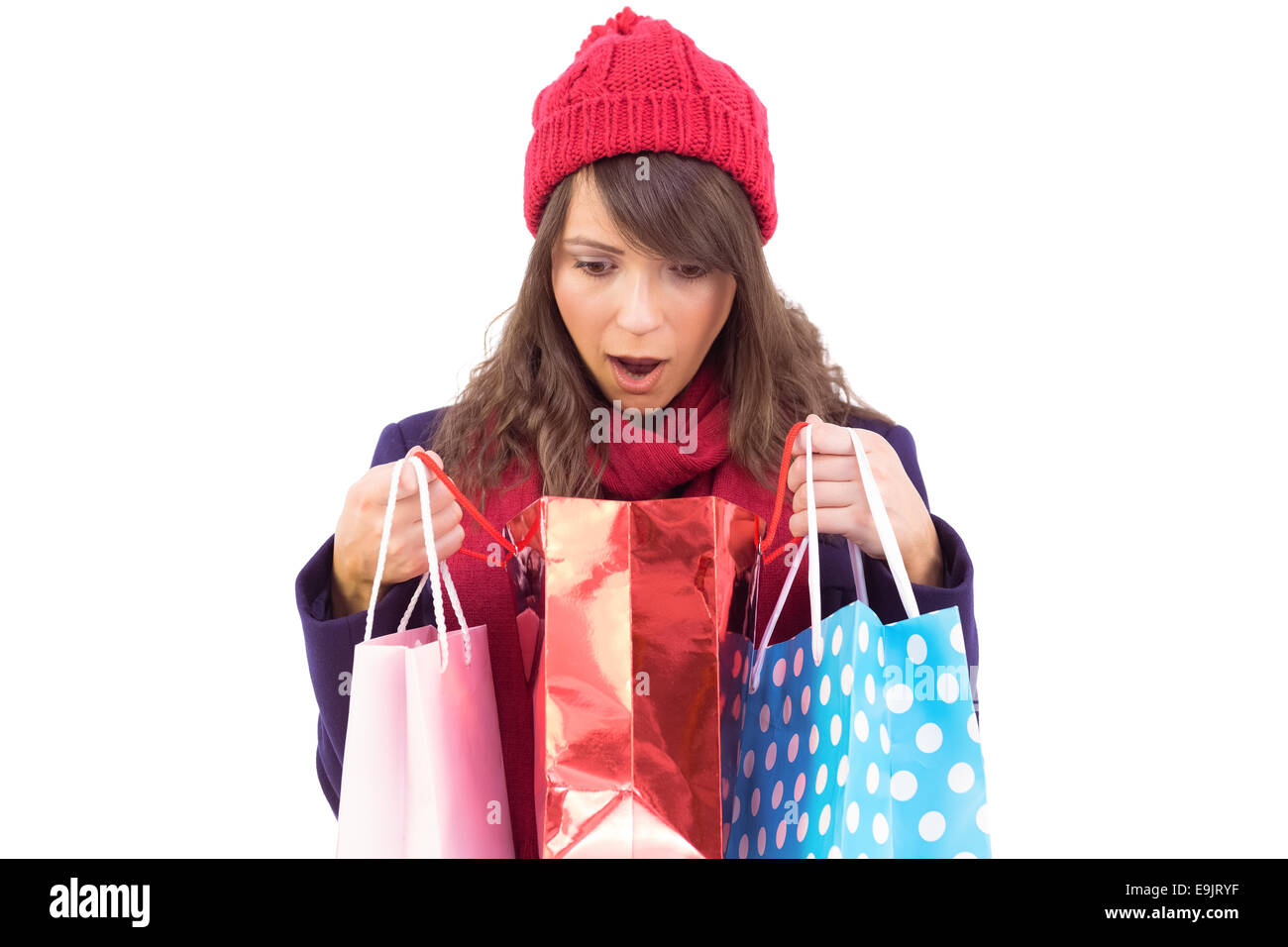 Shocked Brunette Opening Gift Bag Stock Photo Alamy