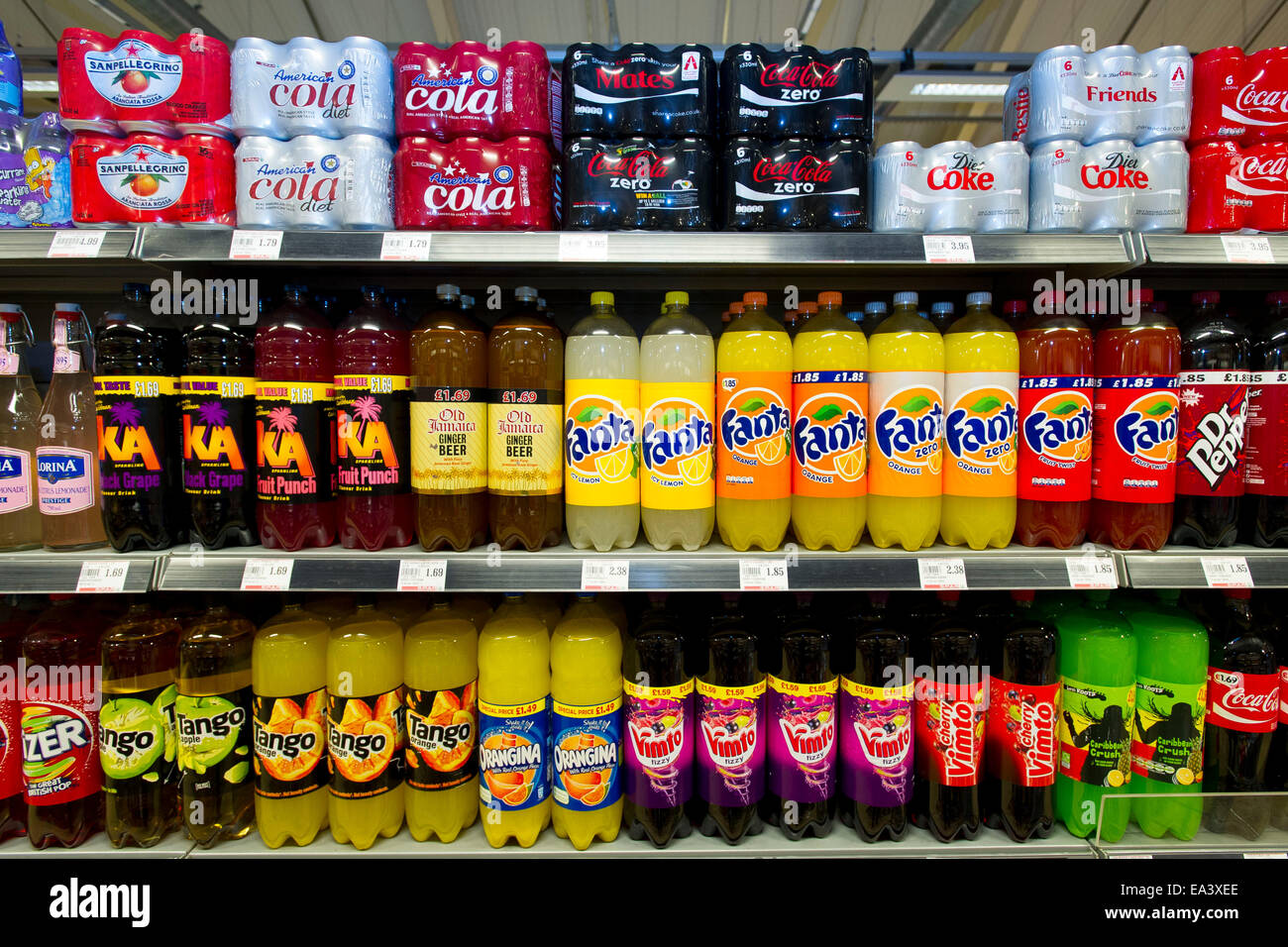 Fizzy drinks on display on a supermarket shelf Stock Photo, Royalty