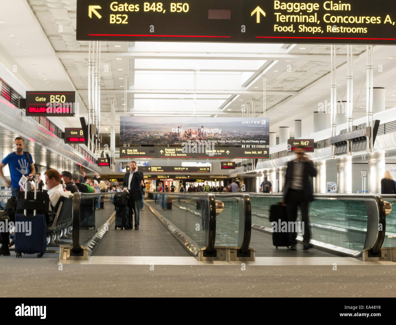 Airport Travelers, Moving Sidewalks and Gates, United Terminal Stock