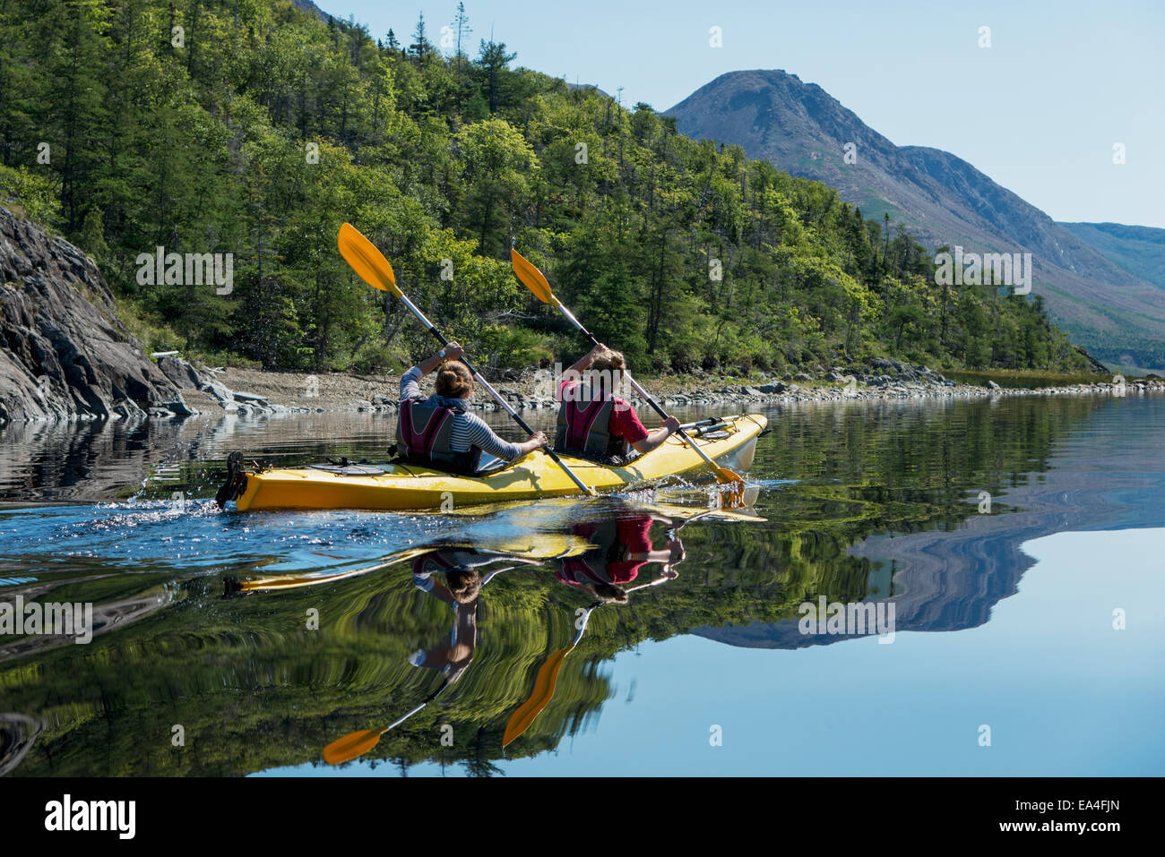 Kayaking in Gros Morne National Park; Trout River, Newfoundland Stock