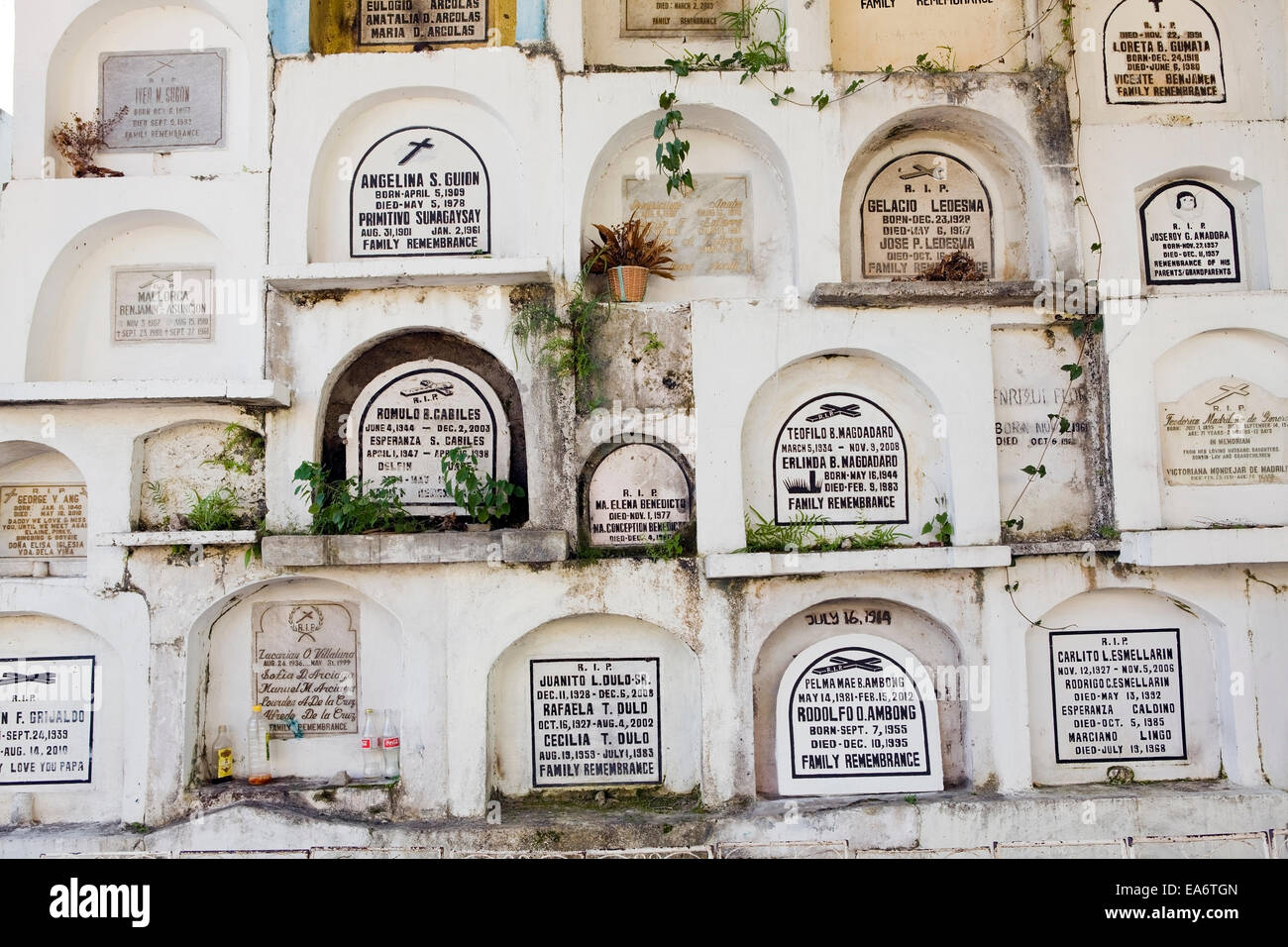 Concrete cemetery crypts stacked many levels high in a Philippine Stock