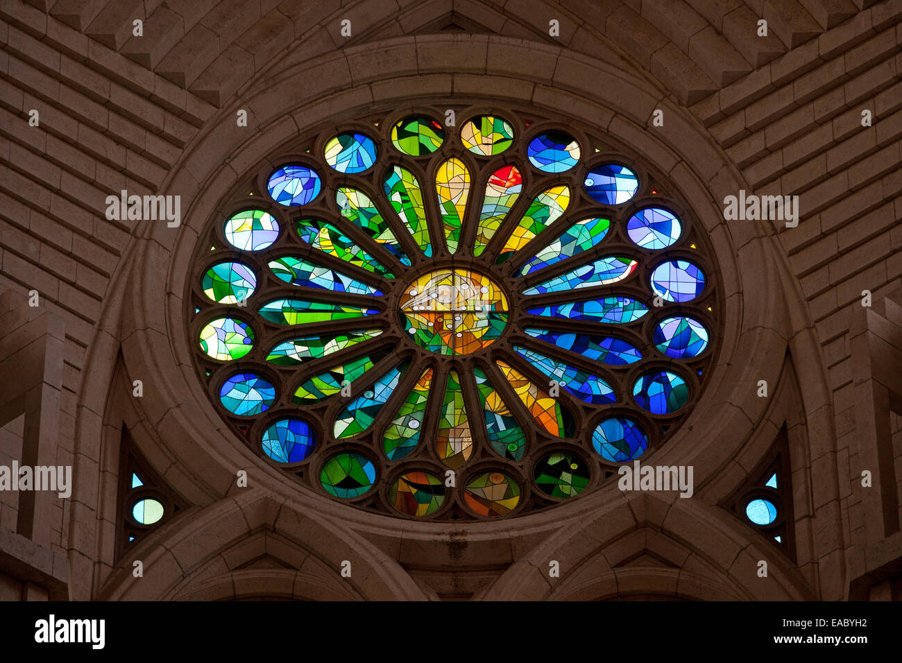 Stained glass rose window in the Sagrada in Barcelona, Catalonia Stock