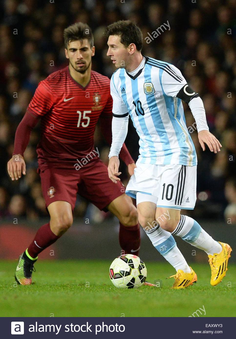 http://c8.alamy.com/comp/EAXWY3/epa04494978-argentinas-lionel-messi-r-goes-past-portugals-andre-gomes-EAXWY3.jpg